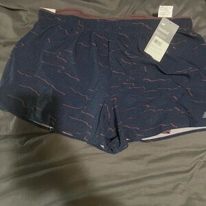 Xl women’s New Balance Navy Athletic Shorts with Rust Accent Pattern NWT